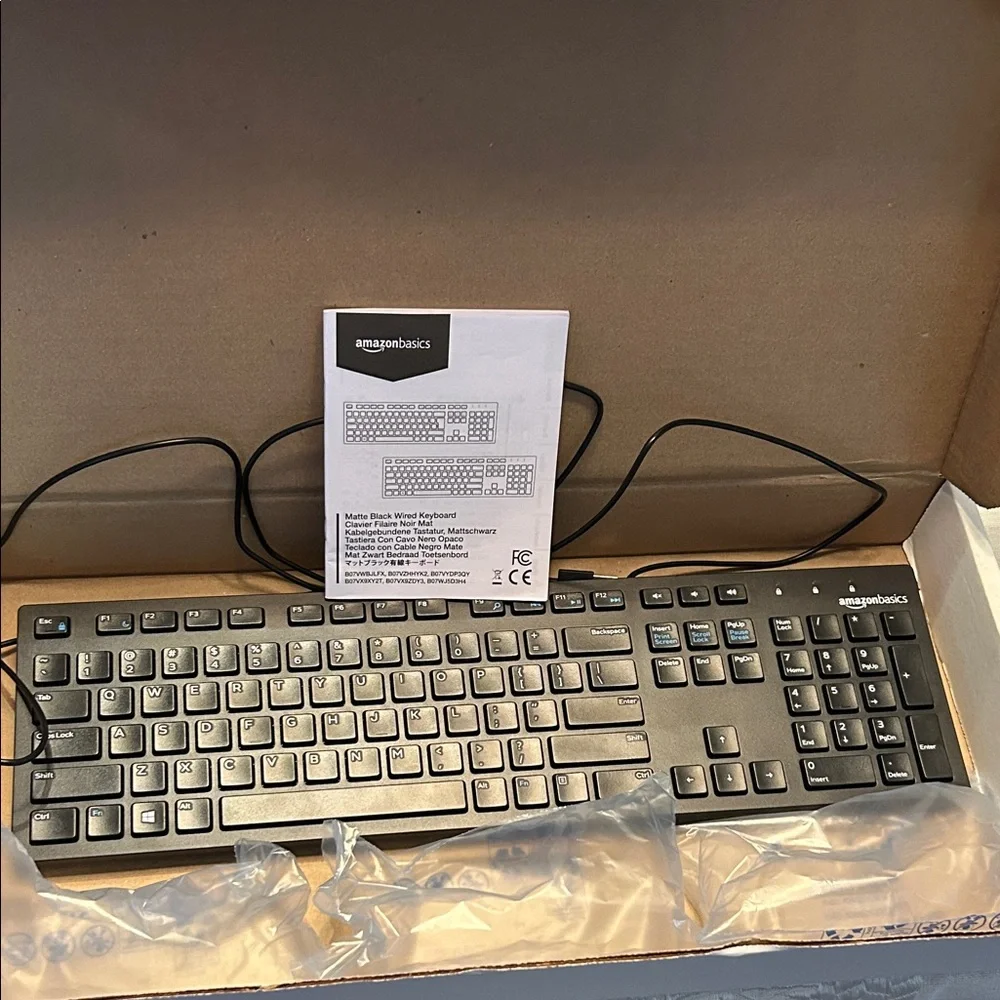 Amazon Basics Wired Keyboard - Sleek Black Design; New with Tags;in original box